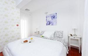 Postel nebo postele na pokoji v ubytování Villa Mateo