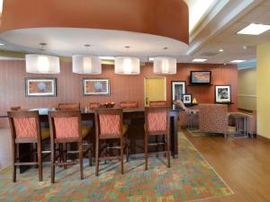 a dining room with a table and chairs at Hampton Inn Martinsville in Martinsville
