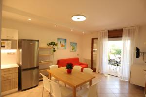 Кухня или мини-кухня в Villaggio Mare Blu
