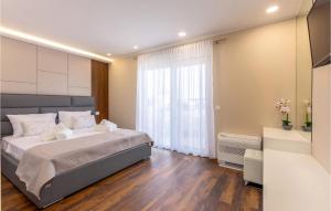 Ein Bett oder Betten in einem Zimmer der Unterkunft Villa Maestral