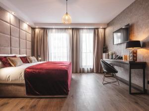 Posteľ alebo postele v izbe v ubytovaní Art Suites Boutique Hotel - Krakow Center