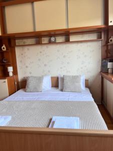 Postel nebo postele na pokoji v ubytování Nova apartman - Kruševac + 4 fotografie