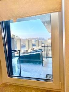 Balkón alebo terasa v ubytovaní Apartamenty Centrum Poznańska - Biały