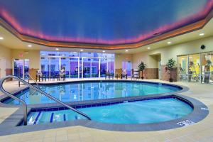 a large swimming pool in a hotel room at Homewood Suites by Hilton Virginia Beach in Virginia Beach