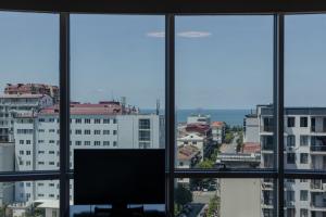 a view of a city from a window at Hotel Aisi in Batumi