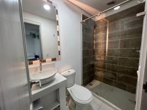 Koupelna v ubytování El Oscar Hotel