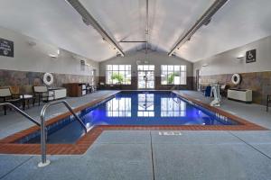 a large swimming pool in a building at Homewood Suites by Hilton Philadelphia-Great Valley in Malvern