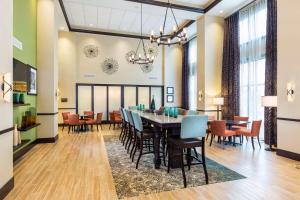 a dining room with a table and chairs at Hampton Inn & Suites Philadelphia Montgomeryville in North Wales