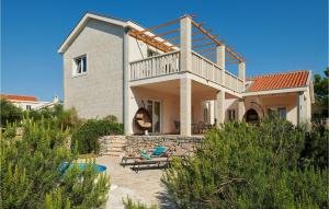 a house with a balcony on top of it at Villa 10 Mala Rudina in Rudina +18 photos