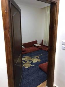 מיטה או מיטות בחדר ב-Your cozy apartment in Al-Karak