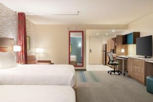 Home2 Suites By Hilton Mesa Longbow, Az客房内的一张或多张床位