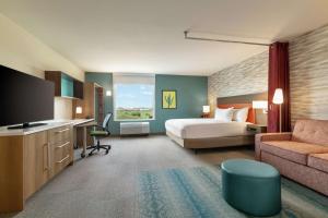 Home2 Suites By Hilton Mesa Longbow, Az客房内的一张或多张床位