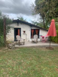 Κήπος έξω από το Le petit lodge cosy