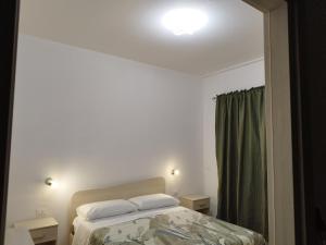 Postel nebo postele na pokoji v ubytování Case Perrone