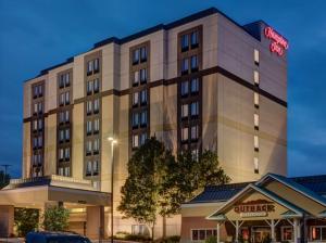 a rendering of the courtyard hotel at dusk at Hampton Inn Pittsburgh-Monroeville in Monroeville