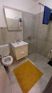 Kúpeľňa v ubytovaní Apartman Nadia Seaview