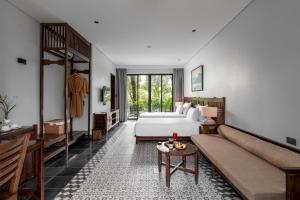 Ein Bett oder Betten in einem Zimmer der Unterkunft Coco Island Resort Ninh Binh