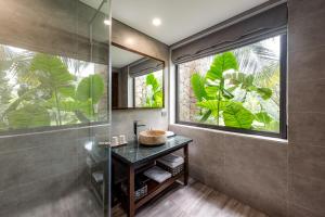 Ein Garten an der Unterkunft Coco Island Resort Ninh Binh