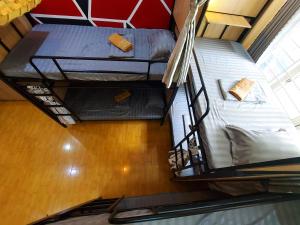 Postel nebo postele na pokoji v ubytování Northern Hostel - Bui Vien Walking Street