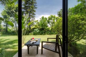 Ein Garten an der Unterkunft Coco Island Resort Ninh Binh