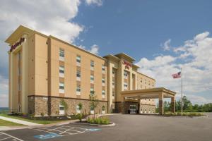 a rendering of a hotel with an american flag at Hampton Inn by Hilton Oxford, ME in Oxford