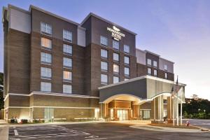 a rendering of a hotel with a parking lot at Homewood Suites by Hilton Raleigh Cary I-40 in Cary