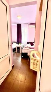 Postel nebo postele na pokoji v ubytování MarNar Hotel
