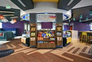 a store with a display of products in a room at Tru By Hilton Burlington in Burlington