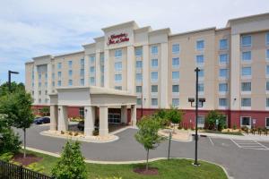 a rendering of the exterior of a hotel at Hampton Inn & Suites Durham North I-85 in Durham