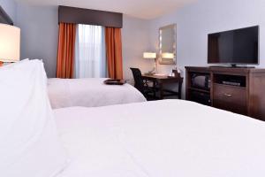 Postel nebo postele na pokoji v ubytování Hampton Inn Rome