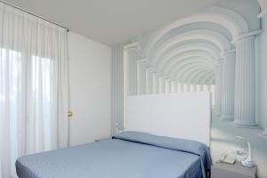 Postel nebo postele na pokoji v ubytování Hotel Anapaya