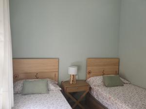 Posteľ alebo postele v izbe v ubytovaní El Arroyo