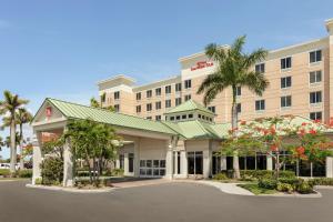 una rappresentazione della parte anteriore di un hotel di Hilton Garden Inn Fort Myers Airport/FGCU a Fort Myers
