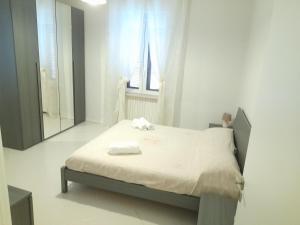 Postel nebo postele na pokoji v ubytování Casa vacanze Perfecta Laetitia Assisi