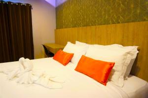 Nest n Rest Hotel客房内的一张或多张床位