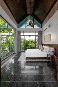 Ein Bett oder Betten in einem Zimmer der Unterkunft Coco Island Resort Ninh Binh