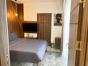 Ένα ή περισσότερα κρεβάτια σε δωμάτιο στο Oxygen Condo +8 φωτογραφίες