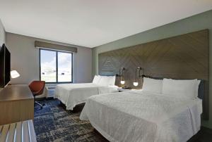 Hampton Inn Patterson, Ca客房内的一张或多张床位