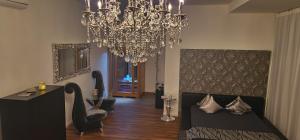 Letto o letti in una camera di Privat-Spa mit Whirlpool und Sauna in Sursee