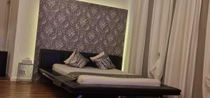 Letto o letti in una camera di Privat-Spa mit Whirlpool und Sauna in Sursee