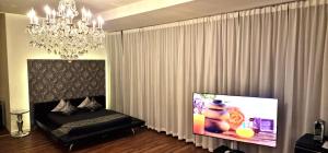 TV o dispositivi per l'intrattenimento presso Privat-Spa mit Whirlpool und Sauna in Sursee