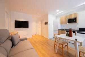 TV a/nebo společenská místnost v ubytování DWO Ábaster Suites
