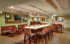 a large dining room with a large table and chairs at Hampton Inn Salt Lake City/Sandy in Sandy