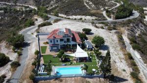 an aerial view of a house with a swimming pool at Kasparis View Residence in Pano Lefkara