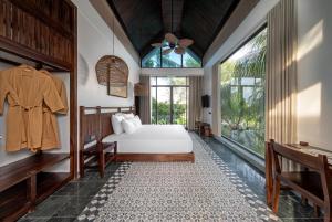 Ein Bett oder Betten in einem Zimmer der Unterkunft Coco Island Resort Ninh Binh