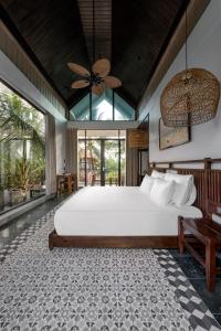 Ein Bett oder Betten in einem Zimmer der Unterkunft Coco Island Resort Ninh Binh