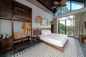 Ein Bett oder Betten in einem Zimmer der Unterkunft Coco Island Resort Ninh Binh