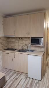 Кухня или мини-кухня в Cozy room in ORBI Palace Hotel
 +9 фотографий