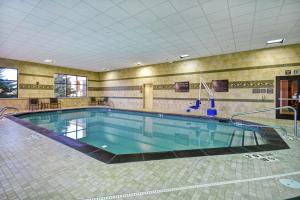 a large swimming pool in a large room at Hampton Inn & Suites Salt Lake City-West Jordan in West Jordan