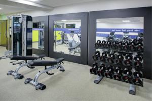 a gym with a rack of fitness equipment at Hampton Inn & Suites Irvine/Orange County Airport in Irvine